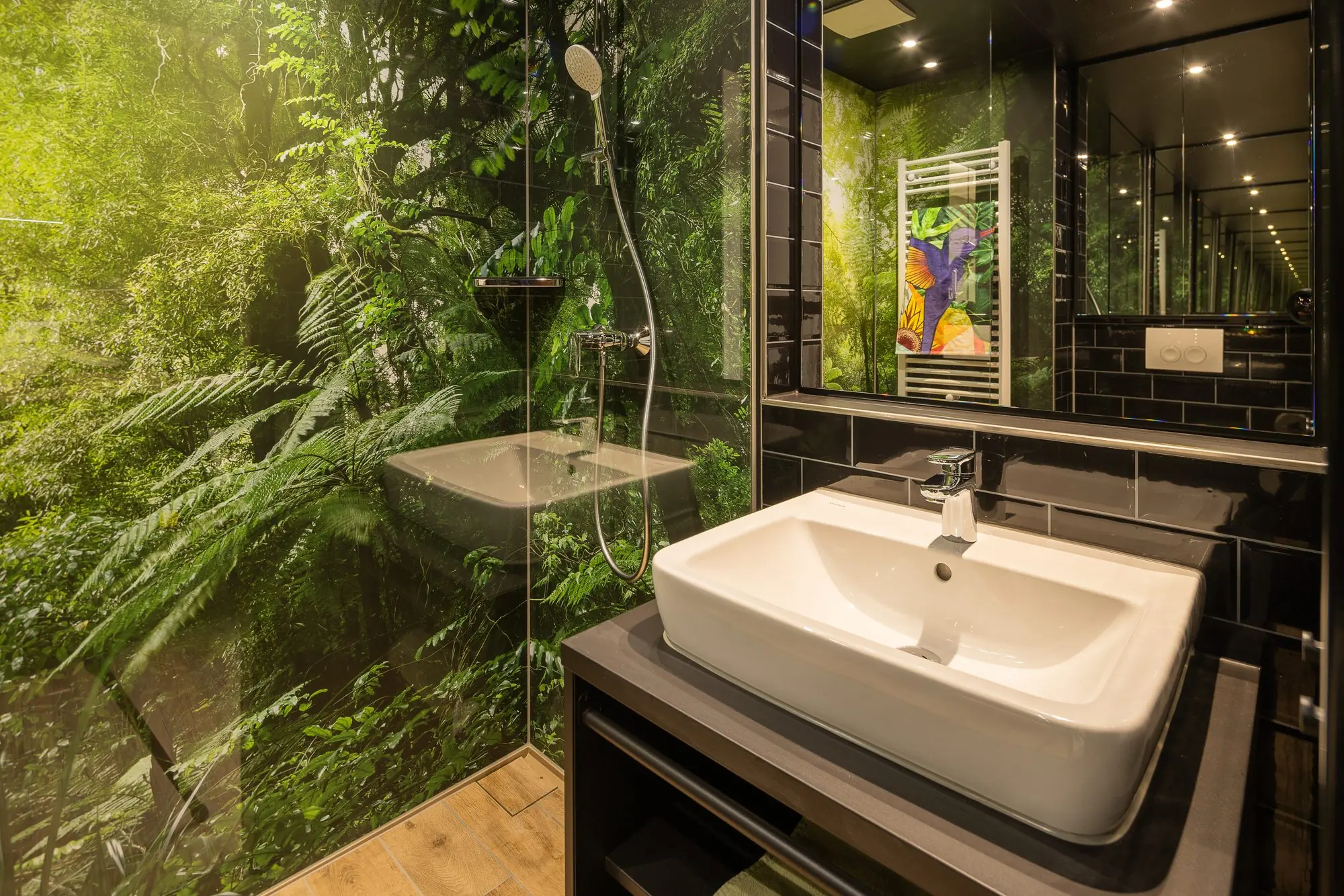 A finished i Live bathroom, the jungle wallpaper and dark tiles unpacked from the same module