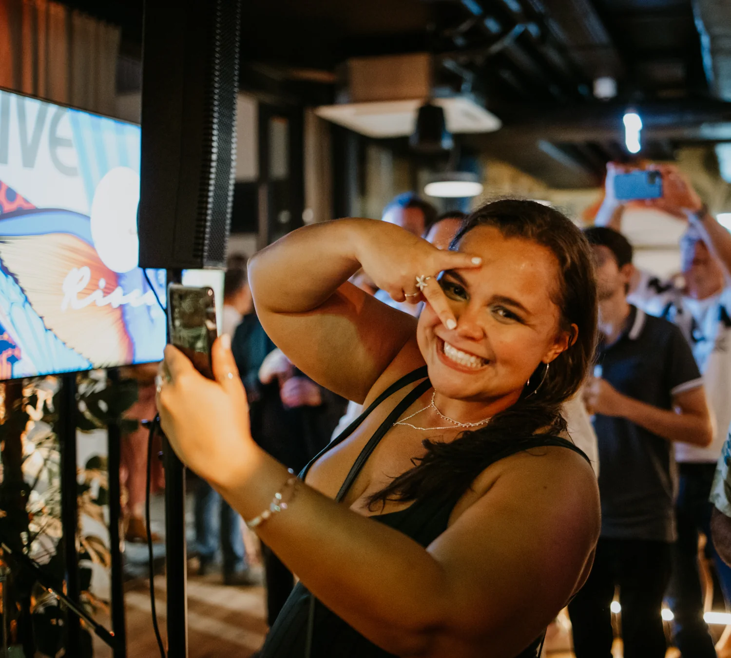 Guest taking a selfie at a Rioca opening party in Vienna